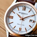 남성용 가죽 워치 추천 - A high-resolution close-up of a luxury wristwatch featuring a full-grain brown leather strap with vi...